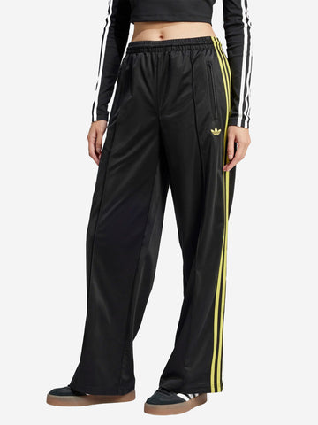 ADIDAS ORIGINALS Pantaloni sportivi oversize 'Firebird' neri con stripes gialle Nero