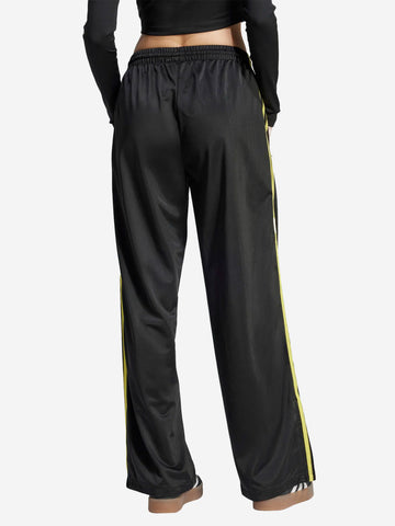 ADIDAS ORIGINALS Pantaloni sportivi oversize 'Firebird' neri con stripes gialle Nero
