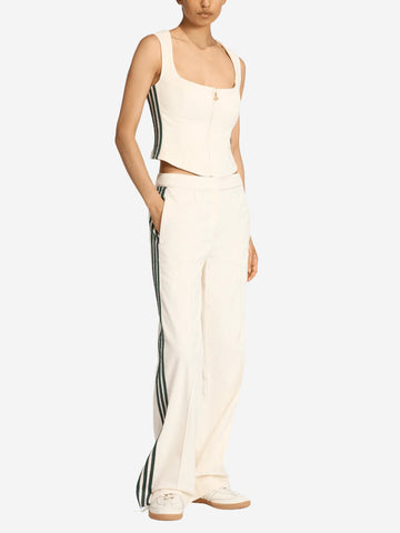 ADIDAS ORIGINALS Pantaloni bianchi in velluto Oktoberfest con dettagli piping Bianco
