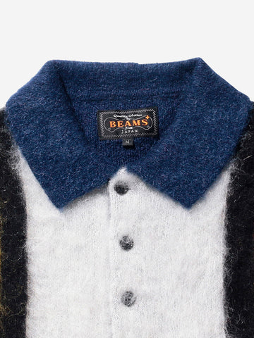 Blaues Poloshirt aus Zottelstrick mit Mohair