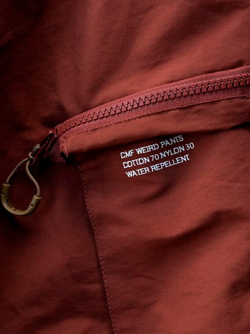 CMF OUTDOOR GARMENT Pantaloni cargo marroni 'Weird' in nylon Marrone arancio