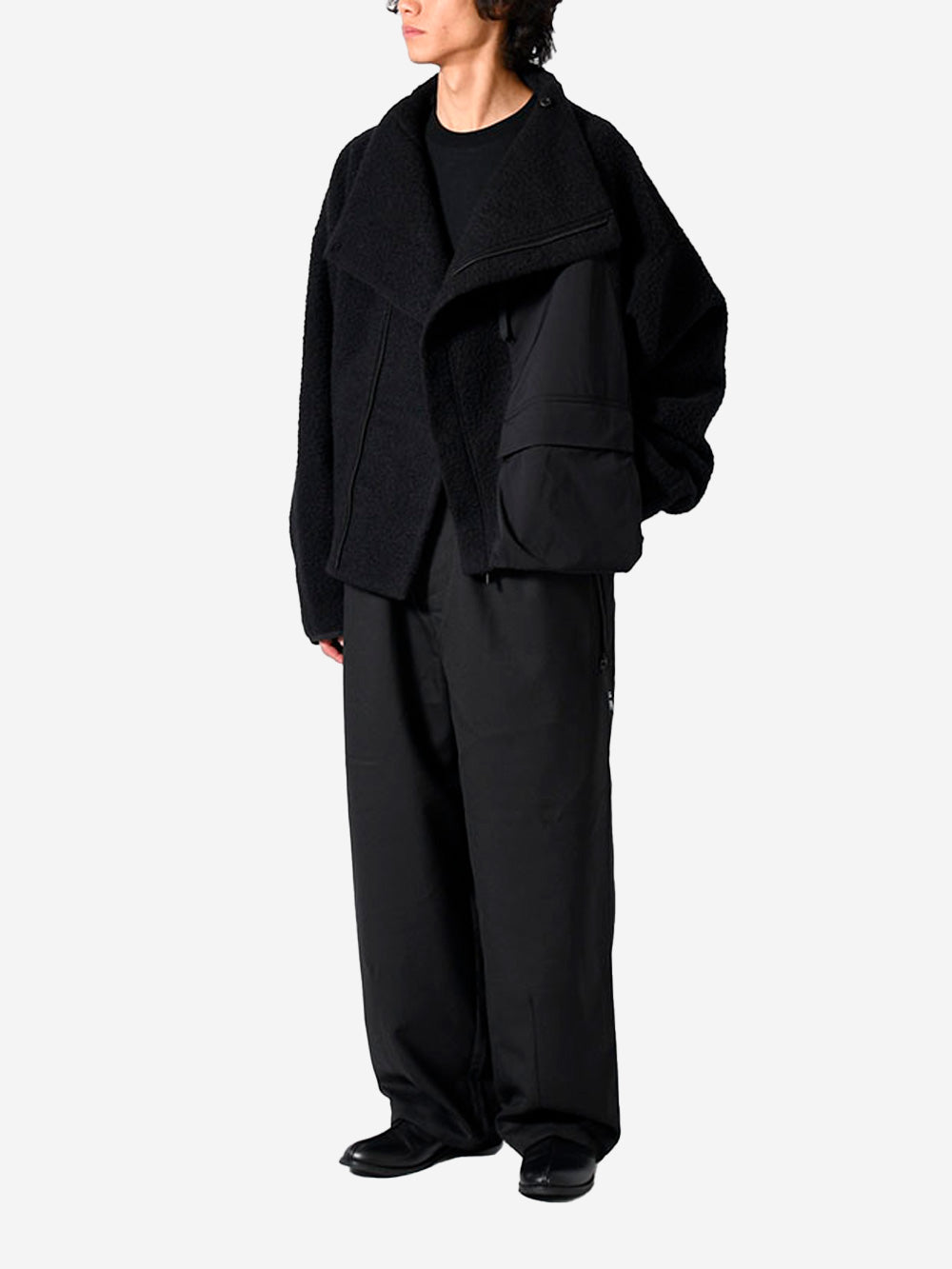 F/CE Giacca in lana asimmetrica con tasche Nero Urbanstaroma