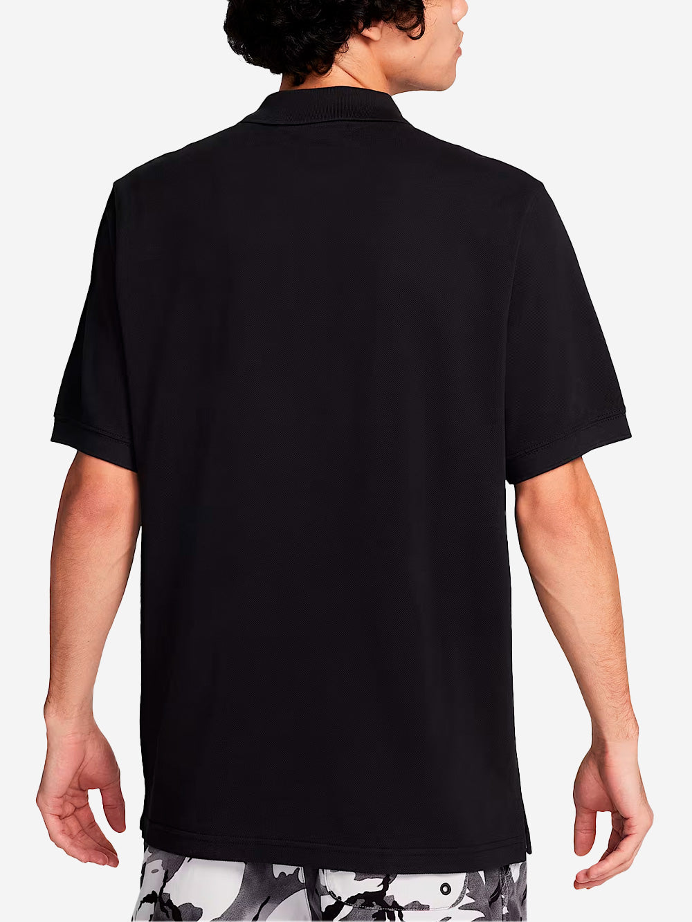 NIKE Polo a manica corta nera con Swoosh Nero Urbanstaroma