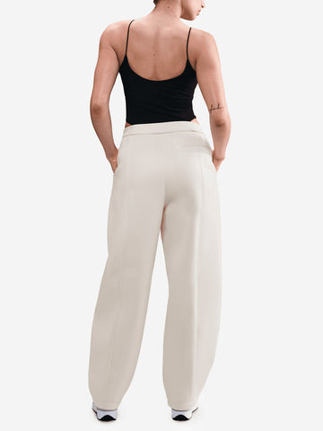 NIKE Pantaloni ampi bianchi misto modal Panna