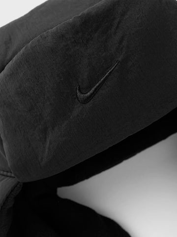 NIKE Cappello Puffer Trapper in pelliccia sintetica Nero