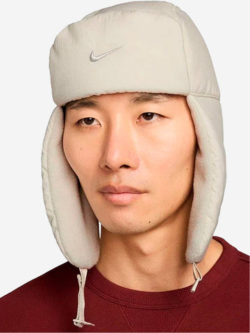 NIKE Cappello Puffer Trapper in pelliccia sintetica Panna