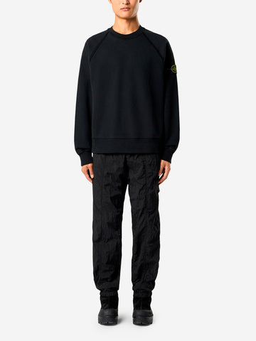 STONE ISLAND Felpa girocollo oversize nera con maniche raglan Nero