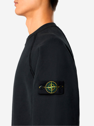 STONE ISLAND Felpa girocollo oversize nera con maniche raglan Nero