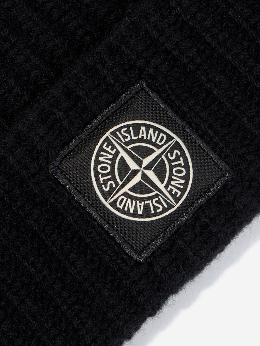 STONE ISLAND Beanie nero in lana con patch Compass e risvolto a costine Nero Urbanstaroma