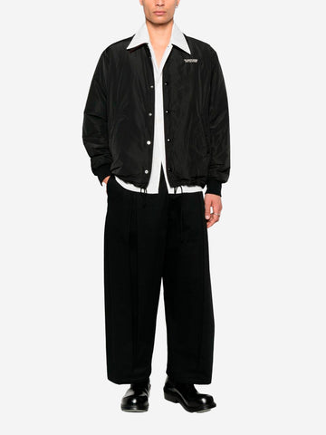 Coach jas met prints