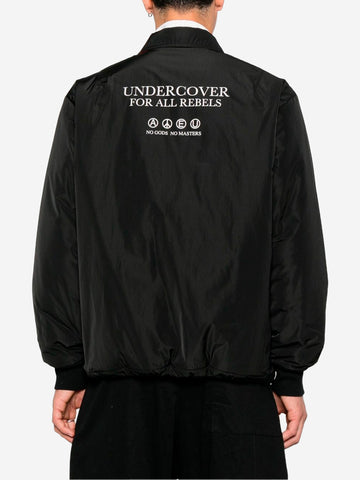 Coach jas met prints