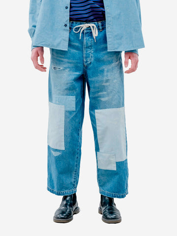 UNIFORM EXPERIMENT Jeans baggy con patchwork Blu