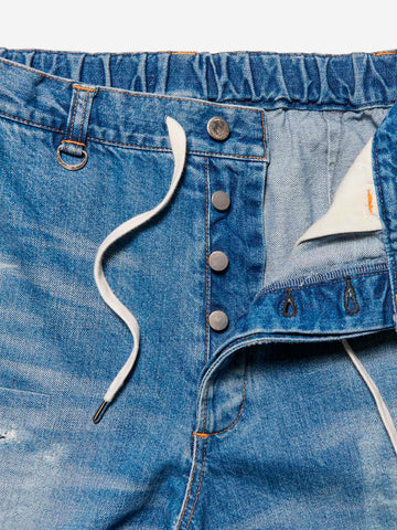 UNIFORM EXPERIMENT Jeans baggy con patchwork Blu