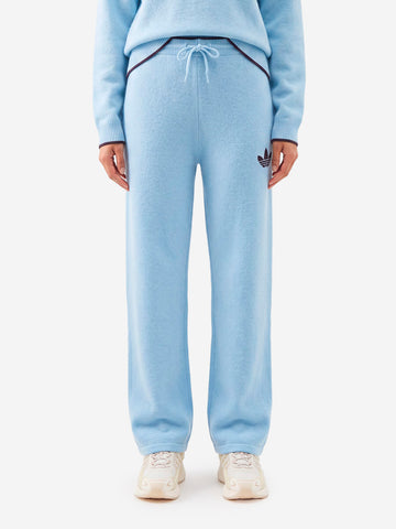 ADIDAS ORIGINALS Pantaloni ESS Knit celesti con bordature a contrasto Celeste