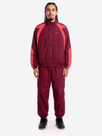NIKE x Drake track jacket woven NOCTA Bordeaux Fucsia