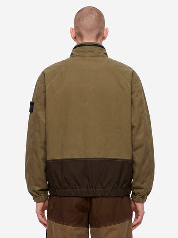 STONE ISLAND Giacca verde militare in cotone con inserti in nylon e logo patch Verde