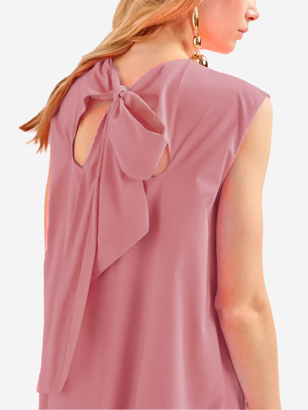 Pink mini dress with open back and bow Pink mini dress with open back and bow