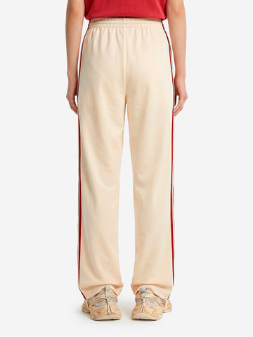 ADIDAS ORIGINALS Pantaloni loose Firebird vaniglia con stripes rosse Panna rossa