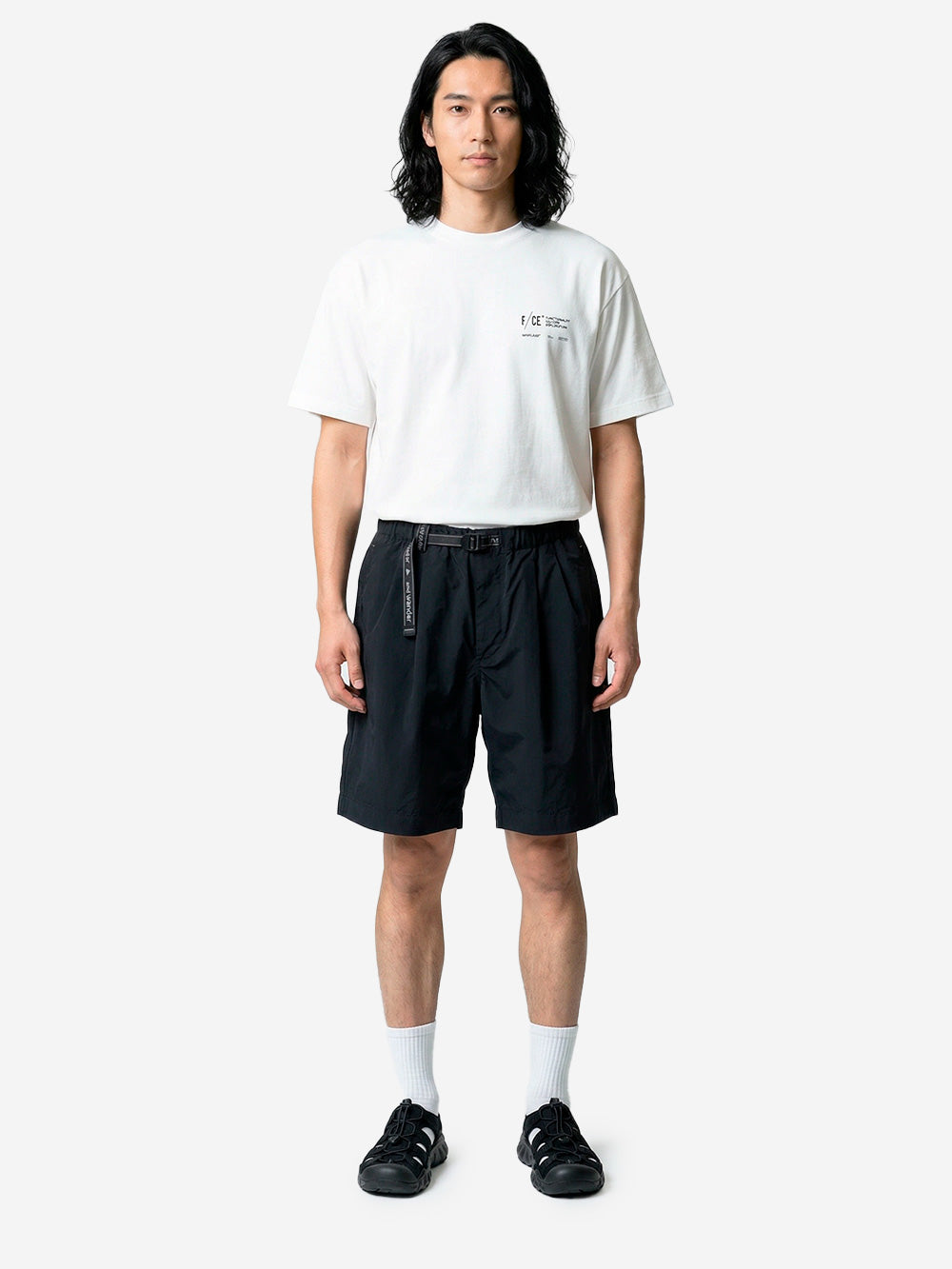 AND WANDER Shorts neri in tessuto tecnico pleated con cintura integrata Nero Urbanstaroma