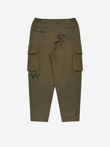 COMME DES GARCONS SHIRT Pantaloni cargo khaki con grafica 'Now Future' Verde