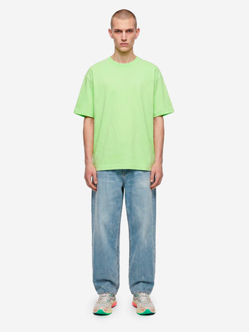 T-shirt in jersey di cotone verde con logo CDG sul retro