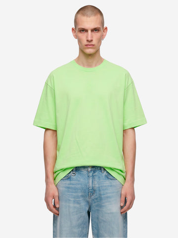 T-shirt in jersey di cotone verde con logo CDG sul retro