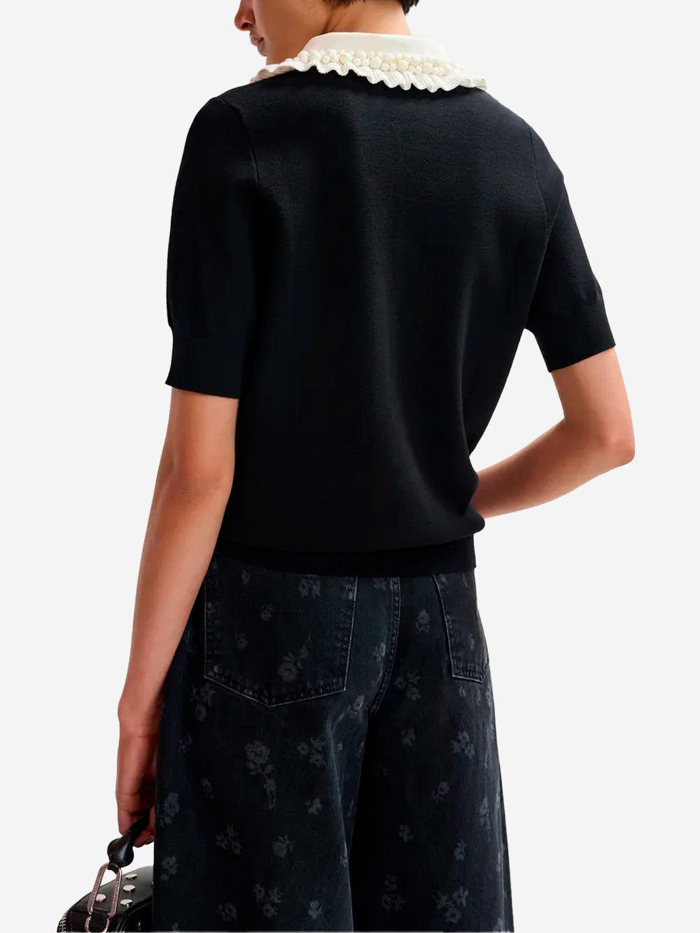 ESSENTIEL ANTWERP Polo in maglia sottile nera e avorio con volant e decorazioni in perline Nera bianca Urbanstaroma