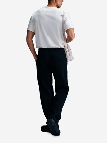 NIKE Pantaloni in fleece con orlo aperto Nero