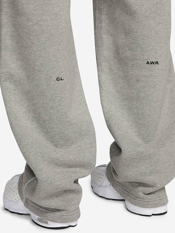 NIKE Pantaloni tuta grigi con bordo aperto CS NOCTA x Drake Grigio