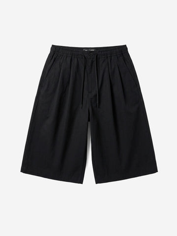 NIKE Shorts oversize neri pleated con Swoosh Nero