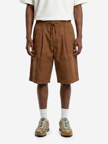 NIKE Shorts oversize marroni pleated con Swoosh Marrone