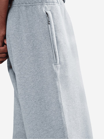 NIKE Pantaloni grigi in fleece con orlo aperto Grigio