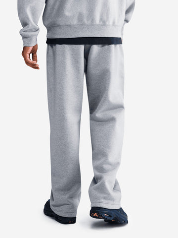 NIKE Pantaloni grigi in fleece con orlo aperto Grigio