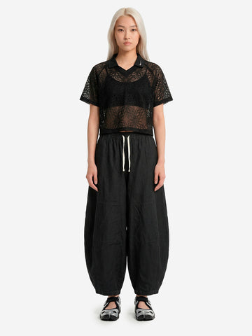 NIKE Polo nera in jersey loose fit con pizzo Nero