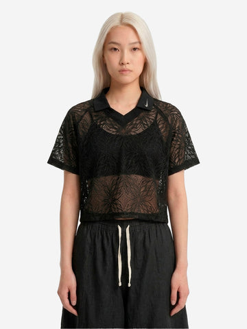 NIKE Polo nera in jersey loose fit con pizzo Nero