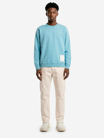 STONE ISLAND Felpa girocollo azzurra in cotone fleece 'Marina' con applicazione riflettente Celeste