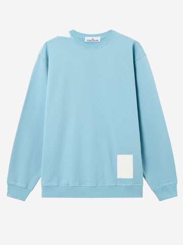 STONE ISLAND Felpa girocollo azzurra in cotone fleece 'Marina' con applicazione riflettente Celeste