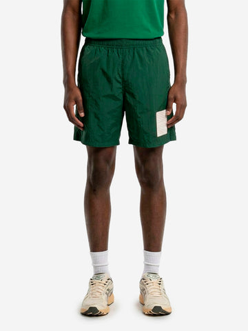 STONE ISLAND Pantaloncini verdi a gamba larga 'Marina' in nylon con patch riflettente Verde