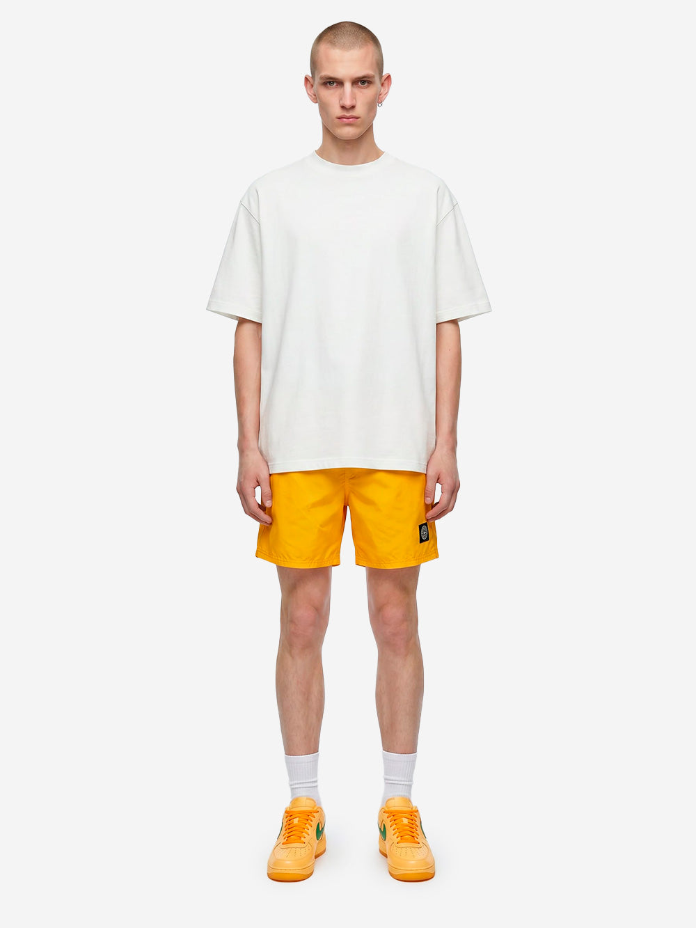 STONE ISLAND Shorts da bagno gialli in nylon garzato con tasche e patch arancione Urbanstaroma