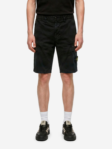 STONE ISLAND Shorts cargo neri slim con cuciture asimmetriche ed effetto old Nero