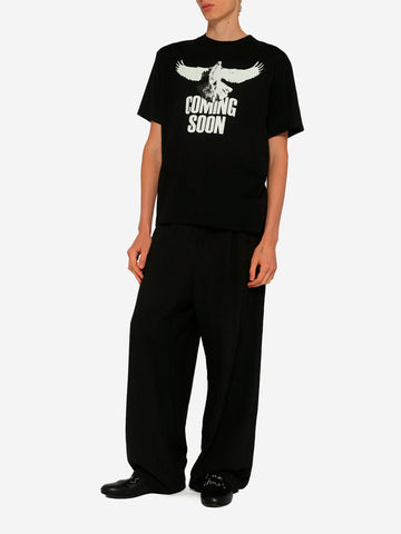 UNDERCOVER T-Shirt nera con grafica 'Coming Soon' Nero