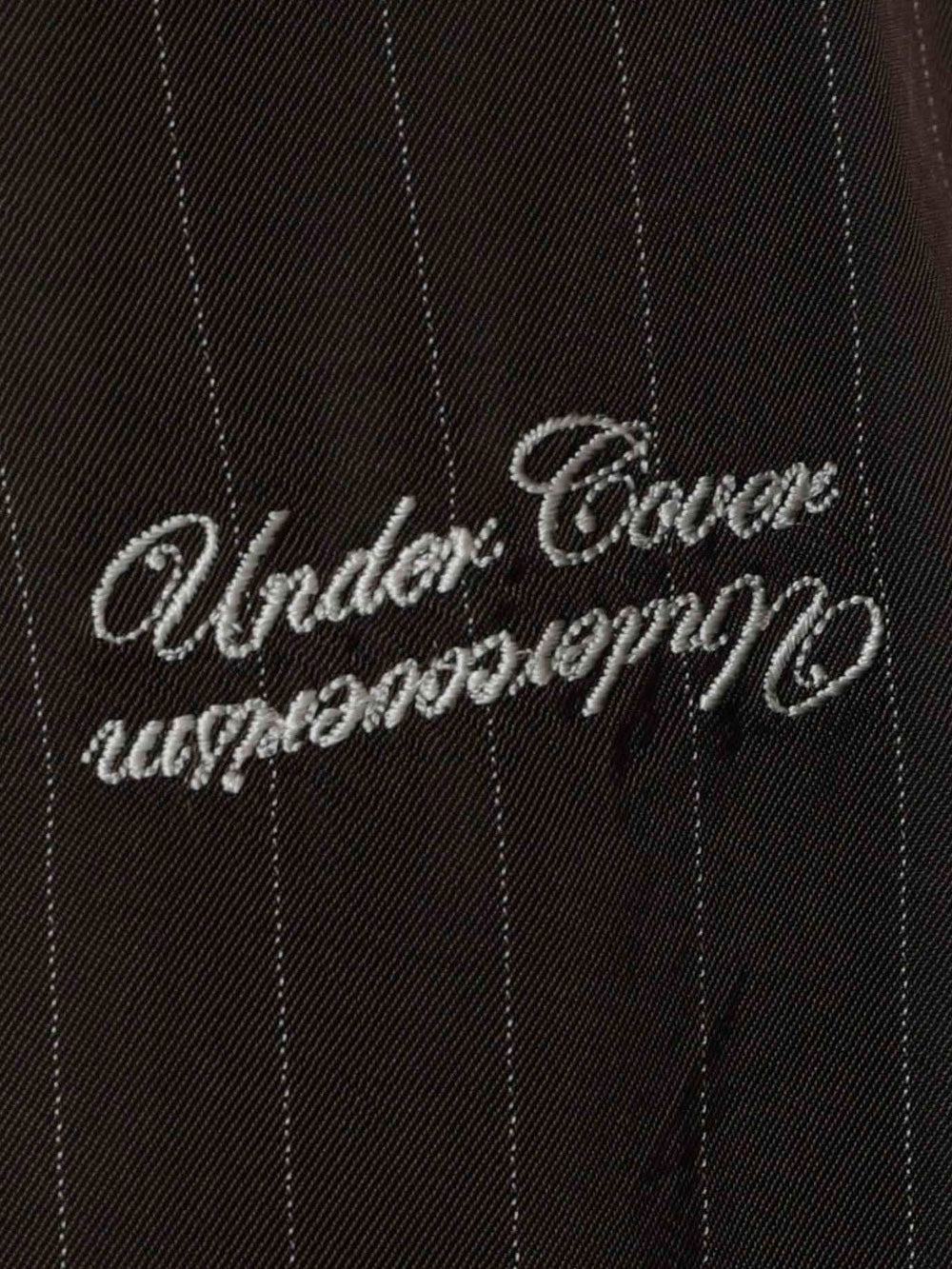 UNDERCOVER Shorts marroni in cupro con motivo gessato e logo Marrone Urbanstaroma