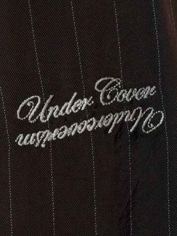 UNDERCOVER Shorts marroni in cupro con motivo gessato e logo Marrone
