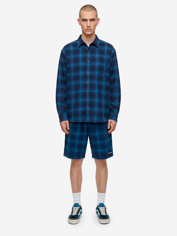 UNIFORM EXPERIMENT Shorts a quadri indigo Blu nero