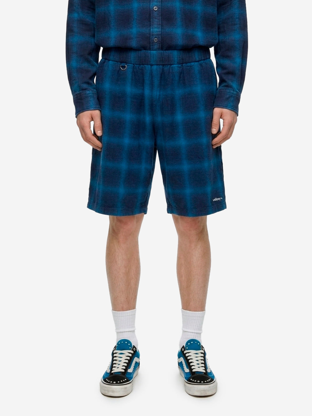 UNIFORM EXPERIMENT Shorts a quadri indigo Blu nero Urbanstaroma