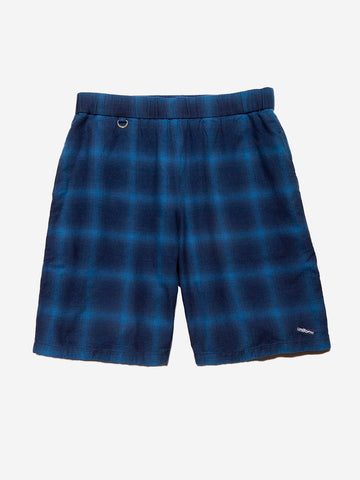 UNIFORM EXPERIMENT Shorts a quadri indigo Blu nero
