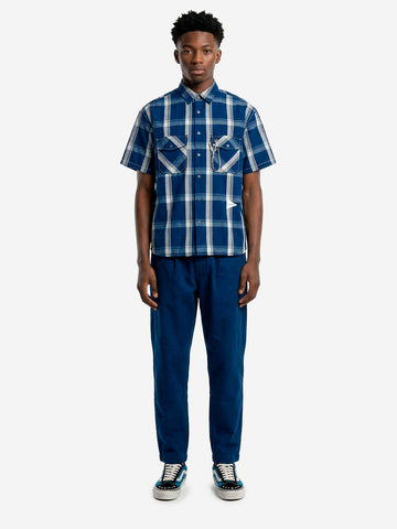 UNIVERSAL WORKS Pantaloni pleated track con pince in tessuto Kimstop in blu Blu